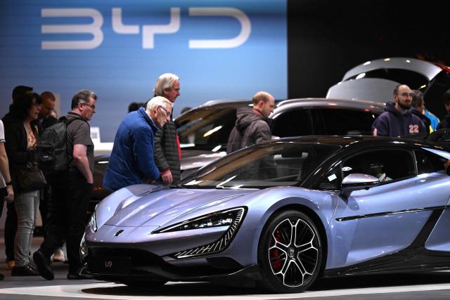 (FILES) A BYD Yangwang U9 car by Chinese car manufacturer BYD is on display at the Essen Motor Show in Essen, western Germany on December 4, 2024. Chinese auto giant BYD sold 2.26 million electric vehicles last year, a company statement at the Hong Kong Stock Exchange showed on January 1, 2026, setting a new record for any firm globally. (Photo by Ina FASSBENDER / AFP)