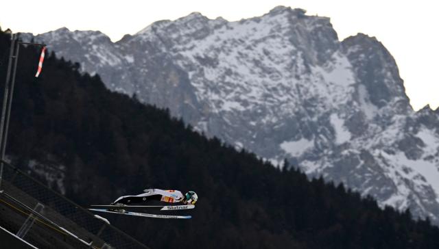 Slovenia's Domen Prevc competes during the Men's Individual Large Hill HS142 event of the FIS Ski Jumping World Cup, the second leg of the Four Hills Tournament, in Garmisch-Partenkirchen, southern Germany on January 1, 2026. (Photo by PHILIPP GUELLAND / AFP)
