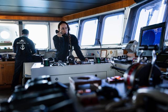 Search and Rescue coordinator, Mar, prepares for a rescue operation onboard of the migrants rescue ship "Ocean Viking" operated by the NGO SOS Mediterranee, at the search-and-rescue zone of the international waters between Malta and Tunisia, on December 31, 2025. (Photo by Sameer Al-DOUMY / AFP)