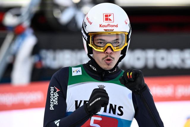 Germany's Philipp Raimund reacts after competing during the Men's Individual Large Hill HS142 event of the FIS Ski Jumping World Cup, the second leg of the Four Hills Tournament, in Garmisch-Partenkirchen, southern Germany on January 1, 2026. (Photo by PHILIPP GUELLAND / AFP)