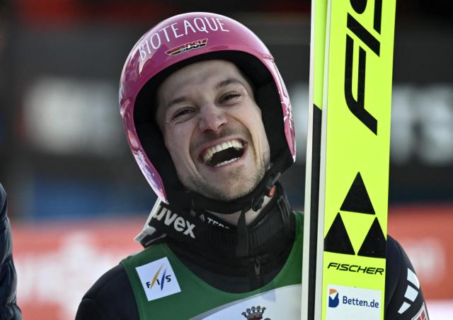 Germany's Felix Hoffmann reacts after competing during the Men's Individual Large Hill HS142 event of the FIS Ski Jumping World Cup, the second leg of the Four Hills Tournament, in Garmisch-Partenkirchen, southern Germany on January 1, 2026. (Photo by PHILIPP GUELLAND / AFP)