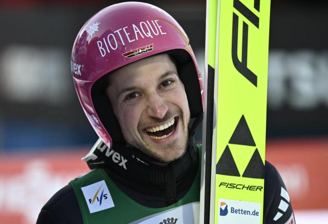 Germany's Felix Hoffmann reacts after competing during the Men's Individual Large Hill HS142 event of the FIS Ski Jumping World Cup, the second leg of the Four Hills Tournament, in Garmisch-Partenkirchen, southern Germany on January 1, 2026. (Photo by PHILIPP GUELLAND / AFP)