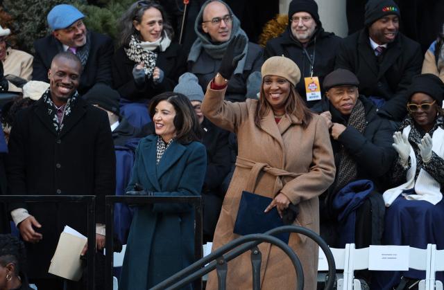 New York Attorney General Letitia James waves as she attends New York Mayor Zohran Mamdani's public inauguration ceremony followed by a block party at City Hall in New York on January 1, 2026. Mamdani, the young upstart of the US left, was sworn in Thursday to take over as New York mayor for a term sure to see him cross swords with President Donald Trump. After the clocks struck midnight, bringing in 2026, Mamdani took his oath of office at an abandoned subway stop to begin managing the United States' largest city. He is New York's first Muslim mayor. (Photo by ANGELA WEISS / AFP)