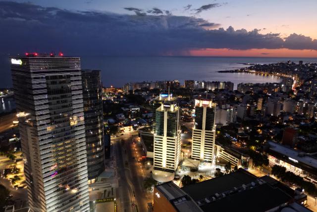 Aerial view showing the World Trade Center (WTC) in Buceo neighbourhood, Montevideo, on December 31, 2025. (Photo by Mariana SUAREZ / AFP)