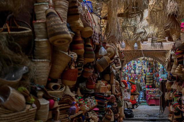 A photograph shows a shop displaying straw bags at the old market in Marrakesh's Jemaa el-Fna Square on January 1, 2026, during the Africa Cup of Nations (CAN) football tournament. (Photo by Khaled DESOUKI / AFP)