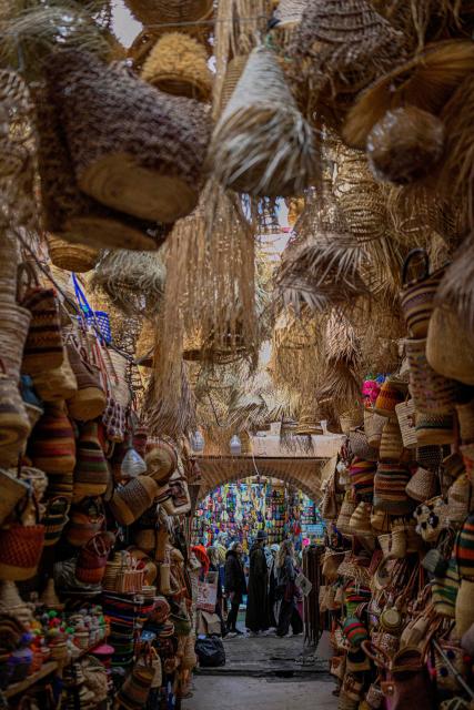 A photograph shows a shop displaying straw bags at the old market in Marrakesh's Jemaa el-Fna Square on January 1, 2026, during the Africa Cup of Nations (CAN) football tournament. (Photo by Khaled DESOUKI / AFP)