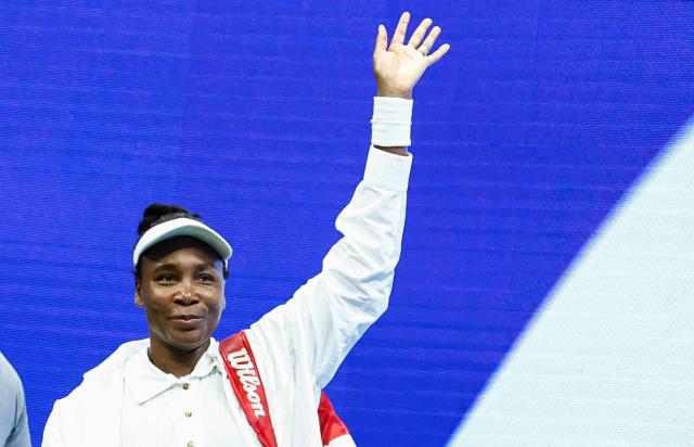 (FILES) USA's Venus Williams waves at supporters after losing against Czech Republic's Karolina Muchova at the end of their women's singles first round tennis match on day two of the US Open tennis tournament at the USTA Billie Jean King National Tennis Center in New York City, on August 25, 2025. Seven-time major singles champion Venus Williams was handed a wildcard to the Australian Open aged 45 on January 2, 2025, becoming the oldest woman ever to play at the season-opening Grand Slam. (Photo by Kena Betancur / AFP)