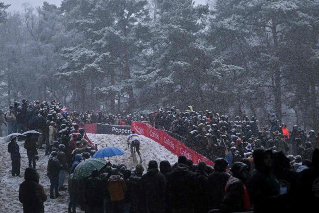 Spectators attend the men's elite race of the Zilvermeercross cyclocross cycling event, stage 5 out of 7 in the Exact Cross competition, in Mol on January 2, 2026. (Photo by LUC CLAESSEN / Belga / AFP) / Belgium OUT