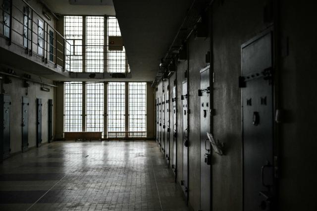 (FILES) This photograph shows a corridor of the historical site of the former Clairvaux penitentiary in Ville-sous-la-Ferte, northeastern France on November 3, 2025. There were 86,229 inmates in French prisons on December 1, 2025, marking another monthly increase amid chronic prison overcrowding, according to data published on January 2, 2026, by France's Ministry of Justice. (Photo by ARNAUD FINISTRE / AFP)