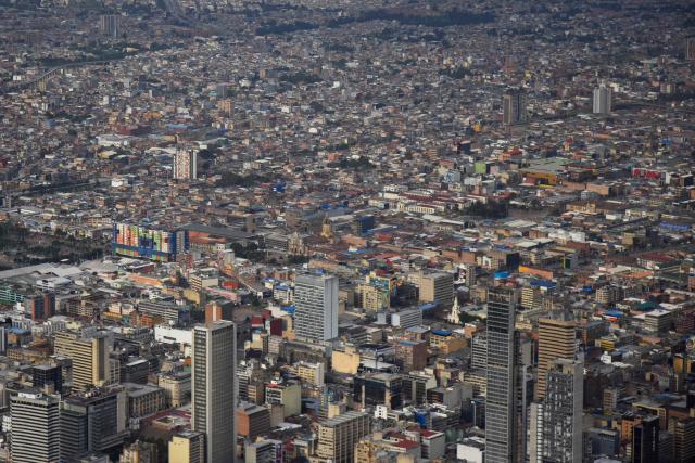 View of downtown Bogota as seen from the Monserrate Hill on January 2, 2026. (Photo by Diana SANCHEZ / AFP)