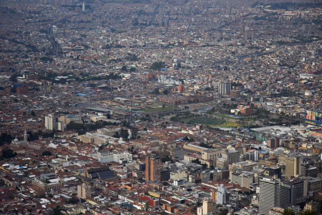 View of downtown Bogota as seen from the Monserrate Hill on January 2, 2026. (Photo by Diana SANCHEZ / AFP)