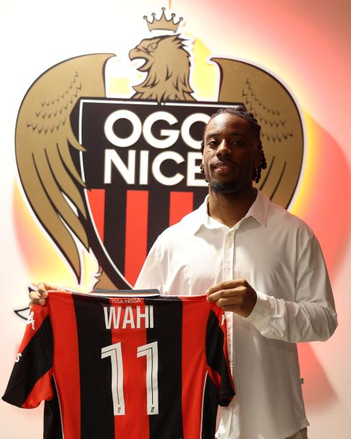 OGC Nice's French new player Elye Wahi Nice poses with his jersey after a press conference in Nice, south-eastern France, on January 2, 2026. (Photo by Valery HACHE / AFP)