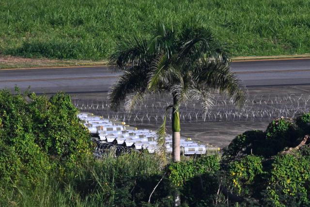 Military armament stands at José Aponte de la Torre Airport, formerly Roosevelt Roads Naval Station, in Ceiba, Puerto Rico, on January 2, 2026. The United States has deployed a major military force in the Caribbean and has recently intercepted oil tankers as part of a naval blockade against Venezuelan vessels it considers to be under sanctions. Since September, US forces have launched dozens of air strikes on boats that Washington alleges, without showing evidence, were transporting drugs. More than 100 people have been killed. (Photo by Miguel J. Rodriguez Carrillo / AFP)