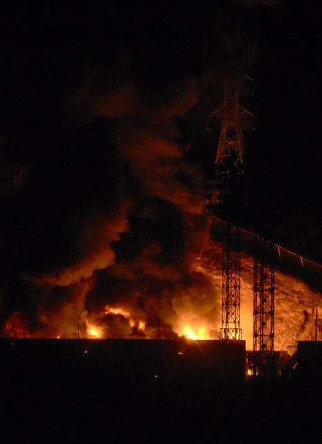 Picture of fire at Fuerte Tiuna, Venezuela's largest military complex, after a series of explosions in Caracas on January 3, 2026. Loud explosions, accompanied by sounds resembling aircraft flyovers, were heard in Caracas around 2:00 am (0600 GMT) on January 3, an AFP journalist reported. The explosions come as US President Donald Trump, who has deployed a navy task force to the Caribbean, raised the possibility of ground strikes against Venezuela. (Photo by Luis JAIMES / AFP)