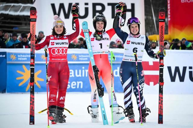 (From L) Second-placed Austria's Julia Scheib, first-placed Switzerland's Camille Rast and third-placed US' Paula Moltzan celebrate in the finish area after competing in the second run of the Women's Giant Slalom, part of the FIS Alpine Ski World Cup 2025-2026, in Kranjska Gora, Slovenia, on January 3, 2026. (Photo by Jure Makovec / AFP)