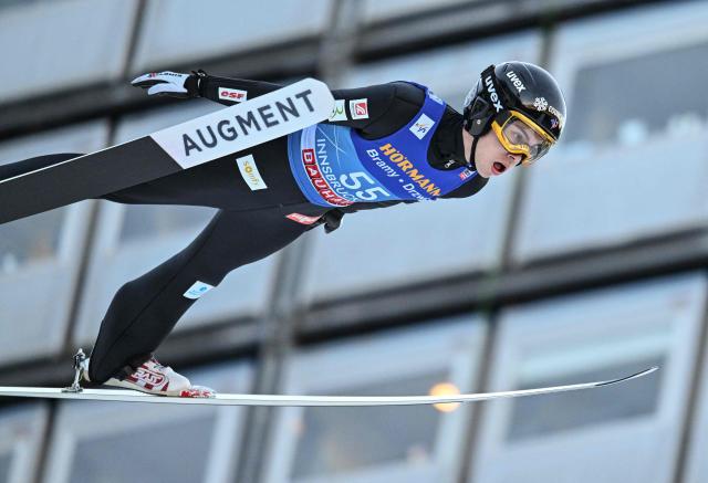 France's Valentin Foubert soars through the air during the qualification round of the Men's Individual Large Hill HS128 event of the FIS Ski Jumping World Cup, the third leg of the Four Hills Tournament, in Innsbruck, Austria on January 3, 2026. (Photo by KERSTIN JOENSSON / AFP)