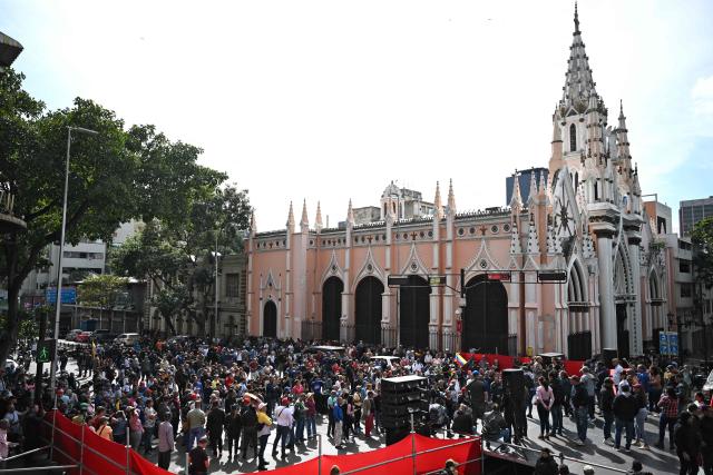Supporters of Venezuela's President Nicolas Maduro gather in the streets of Caracas on January 3, 2026, after US forces captured him. President Donald Trump said Saturday that US forces had captured Venezuela's leader Nicolas Maduro after bombing the capital Caracas and other cities in a dramatic climax to a months-long standoff between Trump and his Venezuelan arch-foe. (Photo by Federico PARRA / AFP)