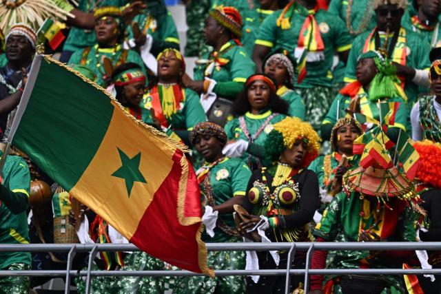 Senegal's supporters cheer before the Africa Cup of Nations (CAN) round of 16 football match between Senegal and Sudan at Grand Stadium in Tangiers on January 3, 2026. (Photo by Gabriel BOUYS / AFP)