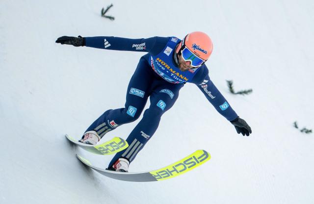 Germany's Pius Paschke competes during the qualification round of the Men's Individual Large Hill HS128 event of the FIS Ski Jumping World Cup, the third leg of the Four Hills Tournament, in Innsbruck, Austria on January 3, 2026. (Photo by GEORG HOCHMUTH / APA / AFP) / Austria OUT