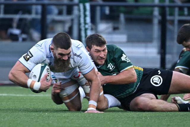 Clermont's Argentine back row Marcos Kremer is tackled during the French Top14 rugby union match between US Montauban and ASM Clermont Auvergne at Stade Sapiac in Montauban, south-western France on January 3, 2026. (Photo by Matthieu RONDEL / AFP)