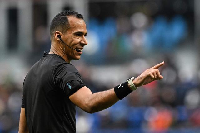 Mauritania's referee Dahane Beida gestures during the Africa Cup of Nations (CAN) round of 16 football match between Senegal and Sudan at Grand Stadium in Tangiers on January 3, 2026. (Photo by Gabriel BOUYS / AFP)