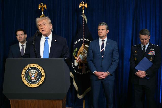 US President Donald Trump, alongside (L/R) Secretary of State Marco Rubio, Secretary of Defense Pete Hegseth, and Chairman of the Joint Chiefs of Staff General Dan Caine, speaks to the press following US military actions in Venezuela, at his Mar-a-Lago residence in Palm Beach, Florida, on January 3, 2026. President Trump said Saturday that US forces had captured Venezuelan leader Nicolas Maduro after launching a "large scale strike" on the South American country. (Photo by Jim WATSON / AFP)