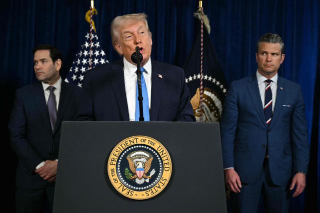US President Donald Trump, alongside Secretary of State Marco Rubio (L) and US Secretary of Defense Pete Hegseth (R), speaks to the press following US military actions in Venezuela, at his Mar-a-Lago residence in Palm Beach, Florida, on January 3, 2026. President Trump said Saturday that US forces had captured Venezuelan leader Nicolas Maduro after launching a "large scale strike" on the South American country. (Photo by Jim WATSON / AFP)