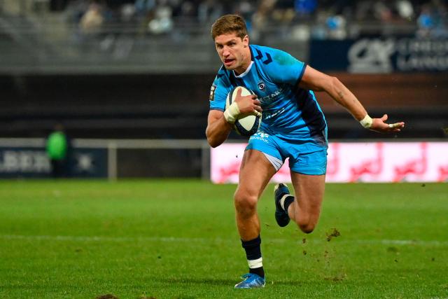 Montpellier’s Argentine fly-half Domingo Miotti runs to score a try during the French Top14 rugby union match between Montpellier Herault Rugby and Aviron Bayonnais (Bayonne) at Septeo Stadium in Montpellier, southern France on January 3, 2026. (Photo by Sylvain THOMAS / AFP)