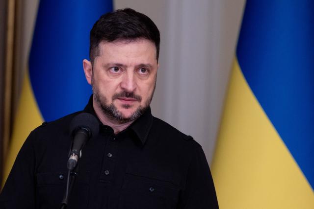 Ukraine's President Volodymyr Zelensky speaks during a meeting of national security advisors of European countries in Kyiv on January 3, 2026, amid the Russian invasion of Ukraine. Security advisers from Ukraine's top allies met in Kyiv for talks on a US-brokered plan to end the war with Russia, days after Kyiv announced a deal was "90 percent" ready. Officials from 15 countries including Britain, France and Germany as well as representatives from NATO and the European Union joined the meeting, the first of several planned for the new year. (Photo by Tetiana DZHAFAROVA / AFP)