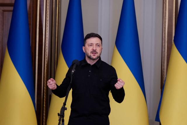 Ukraine's President Volodymyr Zelensky speaks during a meeting of national security advisors of European countries in Kyiv on January 3, 2026, amid the Russian invasion of Ukraine. Security advisers from Ukraine's top allies met in Kyiv for talks on a US-brokered plan to end the war with Russia, days after Kyiv announced a deal was "90 percent" ready. Officials from 15 countries including Britain, France and Germany as well as representatives from NATO and the European Union joined the meeting, the first of several planned for the new year. (Photo by Tetiana DZHAFAROVA / AFP)