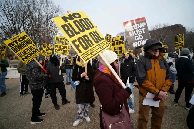 People take part in a demonstration against US military action in Venezuela in front of the White House in Washington, DC, on January 3, 2026. US President Donald Trump said Saturday that the United States will "run" Venezuela and tap its huge oil reserves after snatching leftist leader Nicolas Maduro out of the country during a bombing raid on Caracas. Trump's announcement came hours after a lightning attack in which special forces grabbed Maduro and his wife, while airstrikes pounded multiple sites, stunning the capital city. (Photo by Mandel NGAN / AFP)