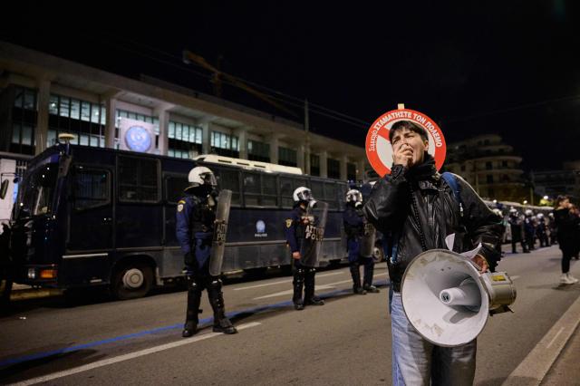 Protesters chant slogans during a demonstration organised by members of Greek Comunist party (KKE) against the recent US operation in Venezuela that resulted in the capture of the Venezuelan President, in front of the US embassy in Athens on January 3, 2026. (Photo by Aggelos NAKKAS / AFP)