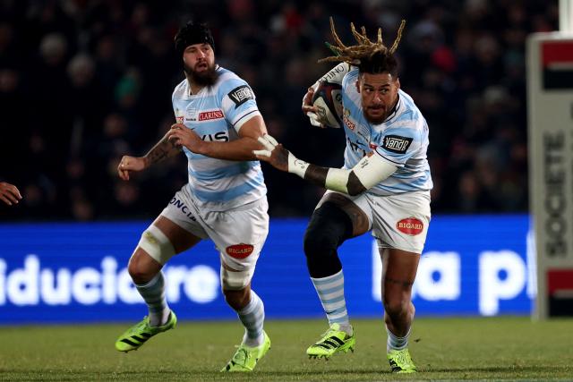 Racing 92' Fijian number 8 Nathan Hughes (R) runs with the ball during the French Top14 rugby union match between Union Bordeaux-Begles (UBB) and Racing 92 at the Chaban-Delmas Stadium in Bordeaux, south-western France on January 3, 2026. (Photo by ROMAIN PERROCHEAU / AFP)