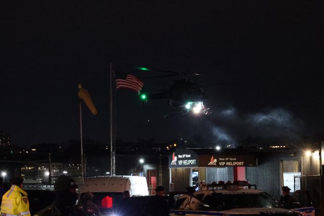 A helicopter carrying ousted Venezuelan president Nicolas Maduro comes in to land at the Westside Heliport in New York on January 3, 2026. Venezuelan President Nicolas Maduro arrived Saturday evening at a military base in the United States after his capture by US forces in Caracas. Maduro was seen surrounded by FBI agents as he descended the boarding stairs of a US government plane at a New York state National Guard facility, and was slowly escorted along the tarmac. (Photo by ANGELA WEISS / AFP)