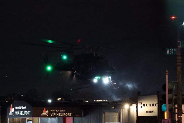 A helicopter carrying ousted Venezuelan president Nicolas Maduro comes in to land at the Westside Heliport in New York on January 3, 2026. Venezuelan President Nicolas Maduro arrived Saturday evening at a military base in the United States after his capture by US forces in Caracas. Maduro was seen surrounded by FBI agents as he descended the boarding stairs of a US government plane at a New York state National Guard facility, and was slowly escorted along the tarmac. (Photo by ANGELA WEISS / AFP)