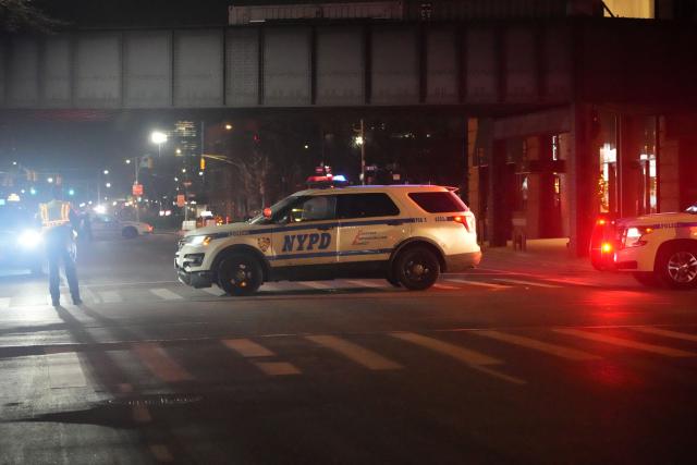 NYPD vehicles block off Tenth Avenue by the US Drug Enforcement Administration (DEA) headquarters in lower Manhattan as Venezuelan President Nicolas Maduro is expected to be transferred on January 3, 2026. Venezuelan President Nicolas Maduro arrived on the evening of January 3 at a military base in the United States after his capture by US forces in Caracas. Maduro was seen surrounded by FBI agents as he descended the boarding stairs of a US government plane at a New York state National Guard facility, and was slowly escorted along the tarmac. (Photo by Bryan R. SMITH / AFP)