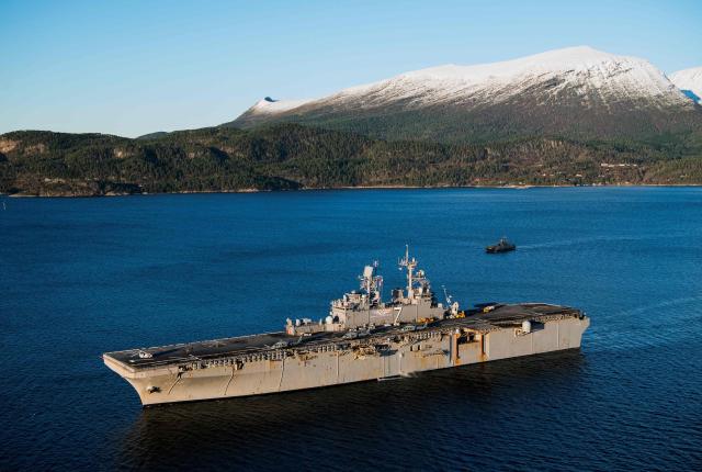 (FILES) The USS Iwo Jima, a Wasp-class amphibious assault ship of the United States Navy takes part in the NATO exercise Trident Juncture 2018 near Trondheim, Norway, on October 29, 2018. US President Donald Trump said on January 3, 2026, that Venezuela's leader Nicolas Maduro was initially extracted by helicopter and was being held on the Iwo Jima, an amphibious assault ship that is part of a large US naval presence in the Caribbean. From there, he will be sent to New York. (Photo by Jonathan NACKSTRAND / AFP)