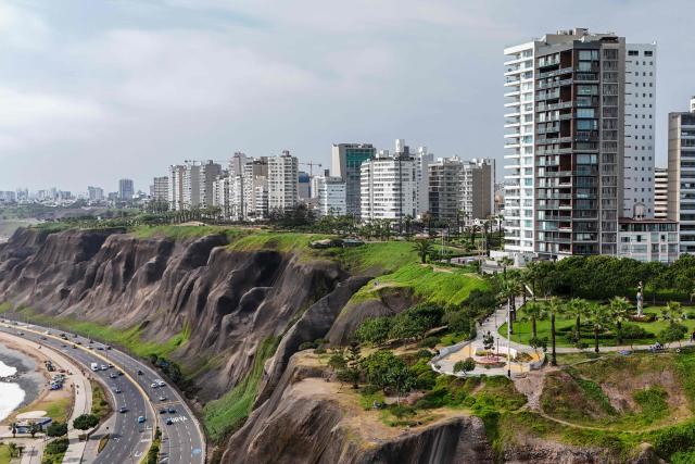 Aerial view of buildings taken from the Love Park in Miraflores, Lima, on January 3, 2026. (Photo by Connie FRANCE / AFP)