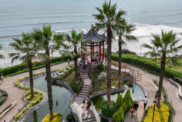 This aerial view shows the Chinese Park in Miraflores, Lima, on January 3, 2026. (Photo by Connie FRANCE / AFP)