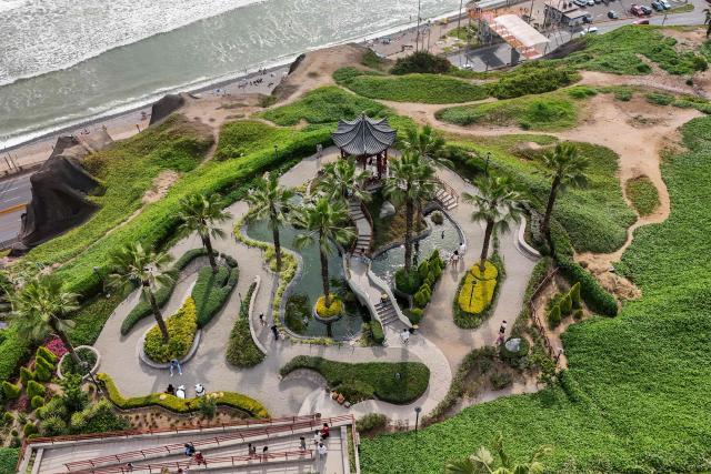 This aerial view shows the Chinese Park in Miraflores, Lima, on January 3, 2026. (Photo by Connie FRANCE / AFP)