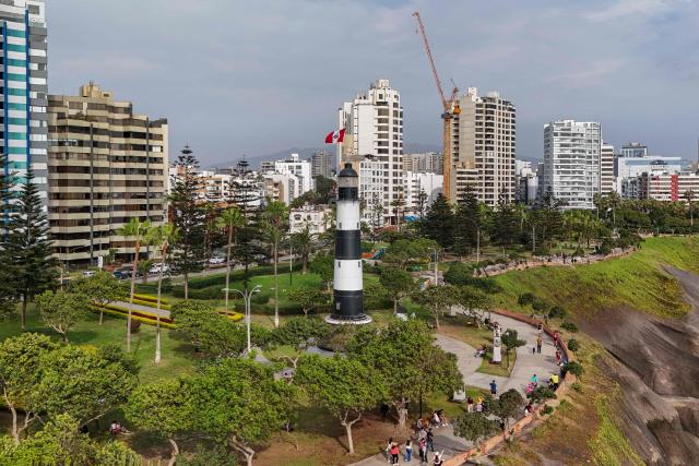 This aerial view shows the park "El Faro" in Miraflores, Lima, on January 3, 2026. (Photo by Connie FRANCE / AFP)