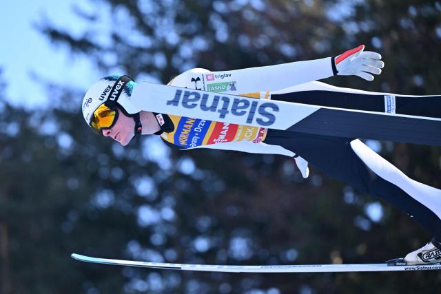 Slovenia's Domen Prevc soars through the air during the trial round for the Men's Individual Large Hill HS128 event of the FIS Ski Jumping World Cup, the third leg of the Four Hills Tournament, in Innsbruck, Austria on January 4 , 2026. (Photo by KERSTIN JOENSSON / AFP)