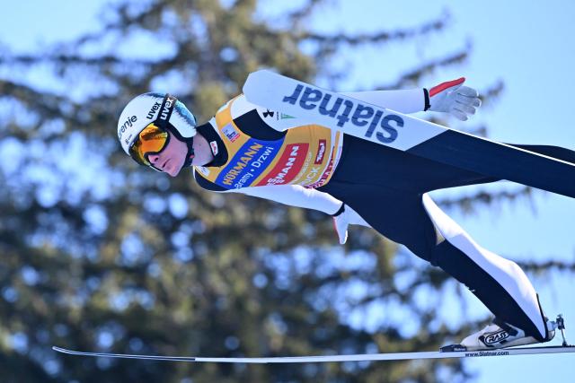 Slovenia's Domen Prevc soars through the air during the trial round for the Men's Individual Large Hill HS128 event of the FIS Ski Jumping World Cup, the third leg of the Four Hills Tournament, in Innsbruck, Austria on January 4 , 2026. (Photo by KERSTIN JOENSSON / AFP)
