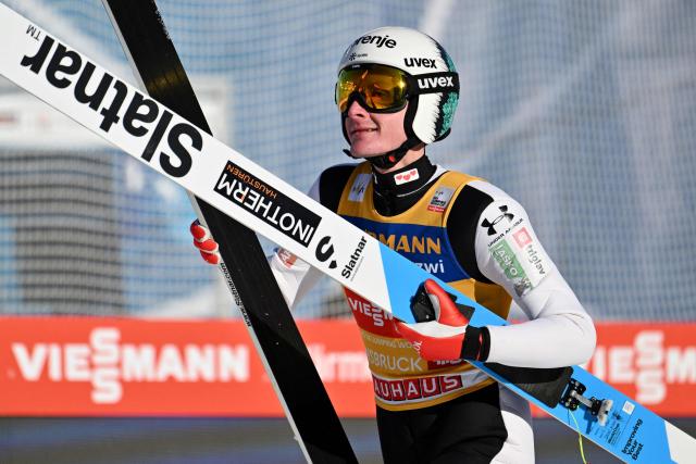 Slovenia's Domen Prevc reacts after his jump during the first round of the Men's Individual Large Hill HS128 event of the FIS Ski Jumping World Cup, the third leg of the Four Hills Tournament, in Innsbruck, Austria on January 4 , 2026. (Photo by KERSTIN JOENSSON / AFP)