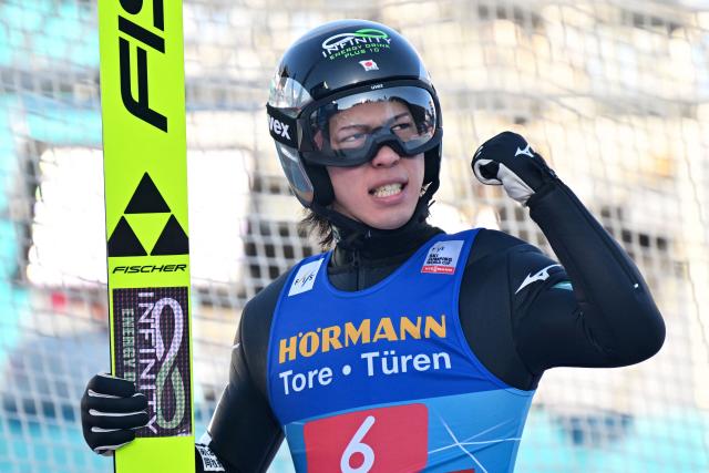 Japan's Ren Nikaido reacts after his jump during the first round of the Men's Individual Large Hill HS128 event of the FIS Ski Jumping World Cup, the third leg of the Four Hills Tournament, in Innsbruck, Austria on January 4 , 2026. (Photo by KERSTIN JOENSSON / AFP)
