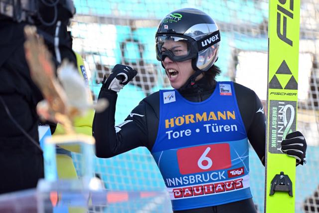 Japan's Ren Nikaido reacts after his jump during the first round of the Men's Individual Large Hill HS128 event of the FIS Ski Jumping World Cup, the third leg of the Four Hills Tournament, in Innsbruck, Austria on January 4 , 2026. (Photo by KERSTIN JOENSSON / AFP)