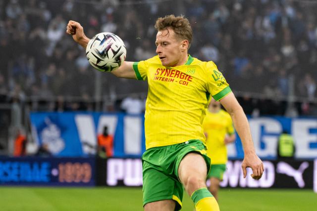 Nantes' French defender #03 Nicolas Cozza controls the ball during the French L1 football match between Olympique de Marseille (OM) and FC Nantes at the Stade Velodrome in Marseille, southern France on January 4, 2026. (Photo by MIGUEL MEDINA / AFP)