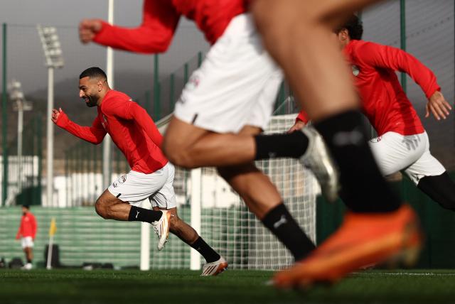 Egypt's forward #10 Mohamed Salah (L) takes part in a training at the Agadir Grand Stadium on January 4, 2026, on the eve of the Africa Cup of Nations (CAN) round of 16 football match between Egypt and Benin. (Photo by Franck FIFE / AFP)