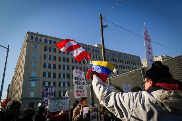 People take part in a demonstration against US military action in Venezuela outside the Metropolitan Detention Center, where ousted Venezuelan President Nicolas Maduro is being held, in the Brooklyn borough of New York City, on January 4, 2026. Venezuelan President Nicolas Maduro was in a New York jail January 3, hours after American special forces seized and flew him out of his country  which Donald Trump said would come under effective US control.
The US president's announcement followed a lightning pre-dawn attack in which commandos grabbed Maduro and his wife while air strikes pounded sites in and around Caracas. (Photo by Kena Betancur / AFP)