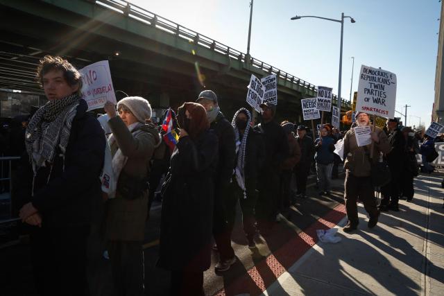 People take part in a demonstration against US military action in Venezuela outside the Metropolitan Detention Center, where ousted Venezuelan President Nicolas Maduro is being held, in the Brooklyn borough of New York City, on January 4, 2026. Venezuelan President Nicolas Maduro was in a New York jail January 3, hours after American special forces seized and flew him out of his country  which Donald Trump said would come under effective US control.
The US president's announcement followed a lightning pre-dawn attack in which commandos grabbed Maduro and his wife while air strikes pounded sites in and around Caracas. (Photo by Kena Betancur / AFP)